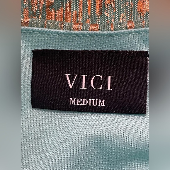 VICI CRISHELLE TWISTED FRONT METALLIC
PLISSE - MINT DRESS - Picture 10 of 11